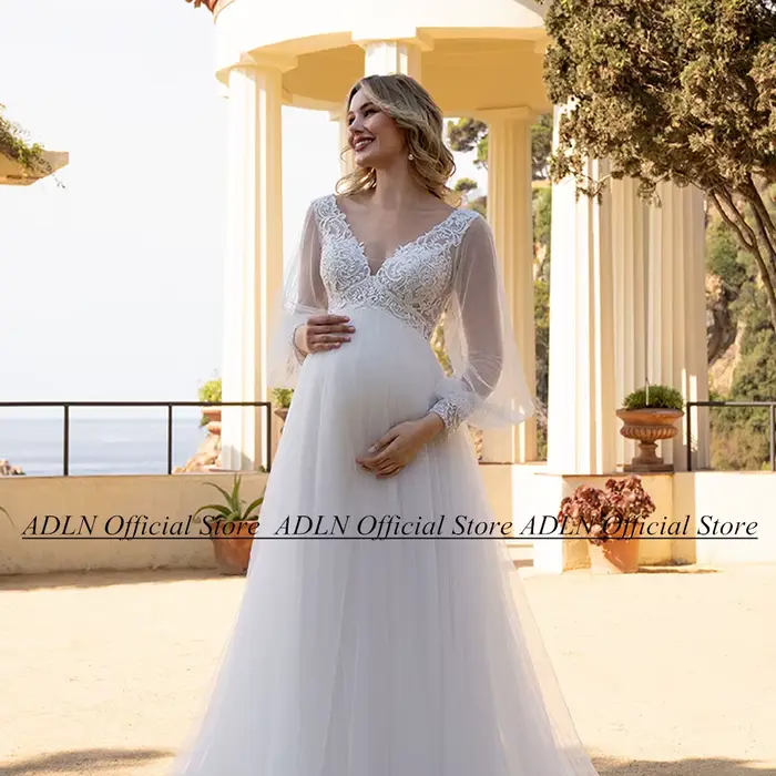 Robe de mariée ivoire blanche pour mariée enceinte