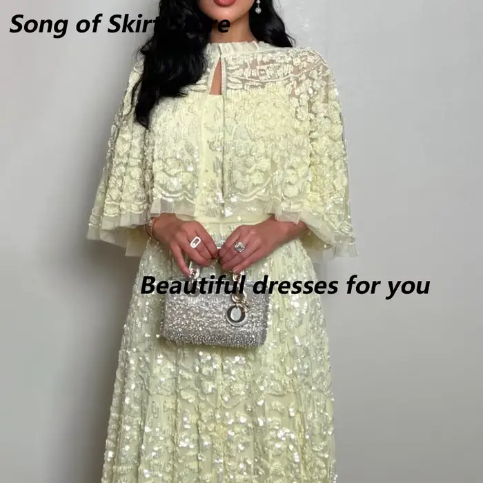 Robe de soirée de luxe jaune avec appliques en dentelle