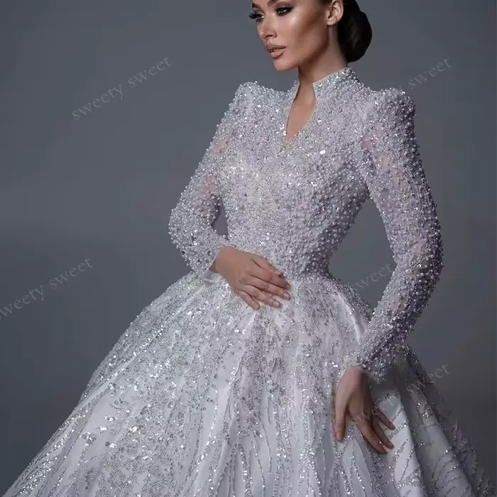 Robe De mariée luxueuse entièrement perlée