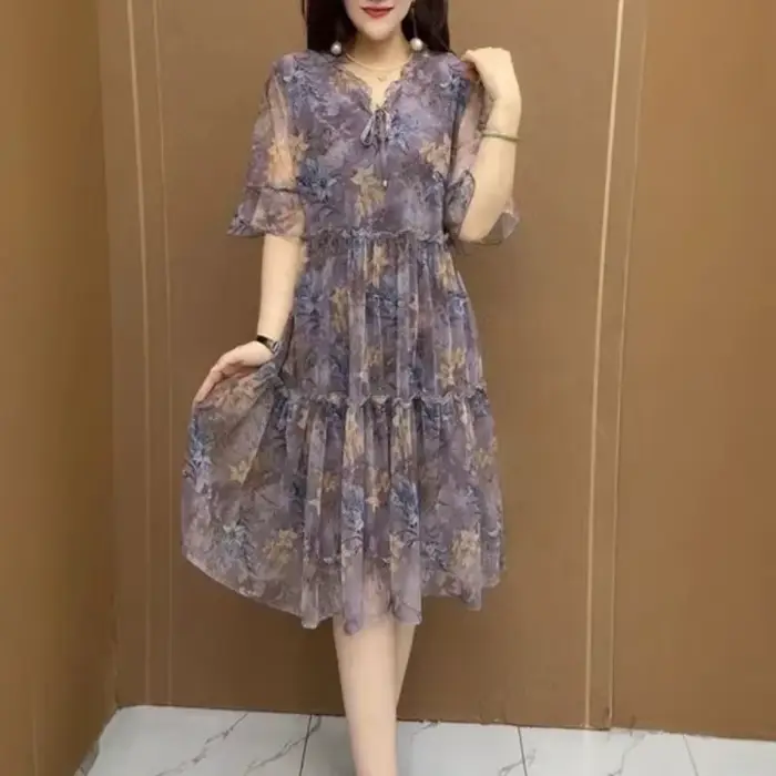 Robe d'été bohème à imprimé floral vert avec manches bouffantes