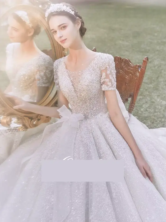 Robe de mariée à manches courtes