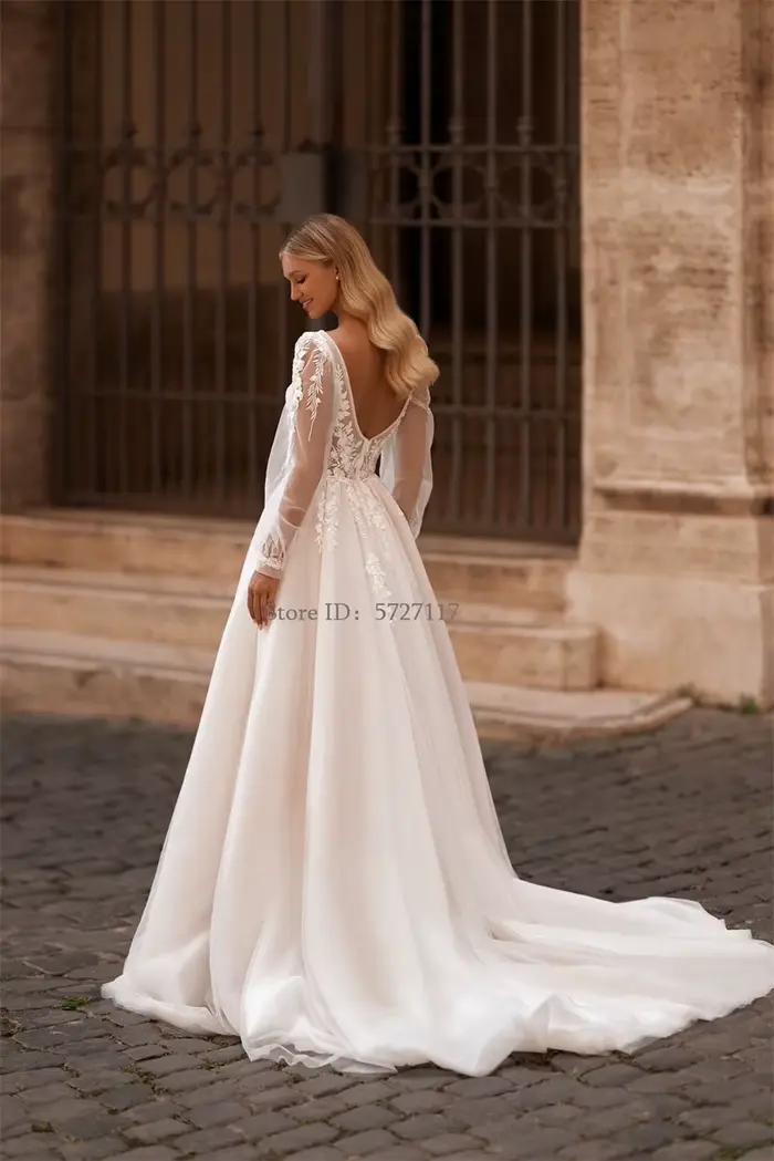 Robe de Mariage Luxe à Manches Bouffantes Col en V Appliques Dentelle Complexes Occasions Spéciales