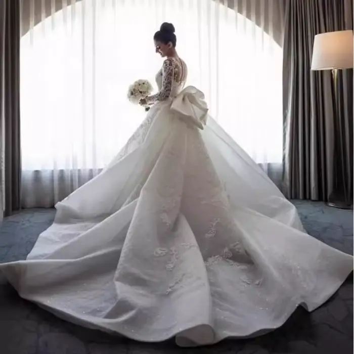 Robe de mariée sirène en dentelle à manches longues