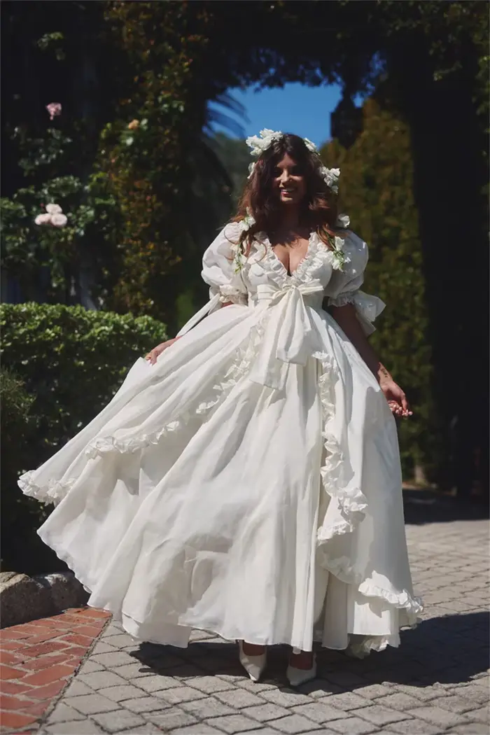 Robe de mariée personnalisée à manches bouffantes florales
