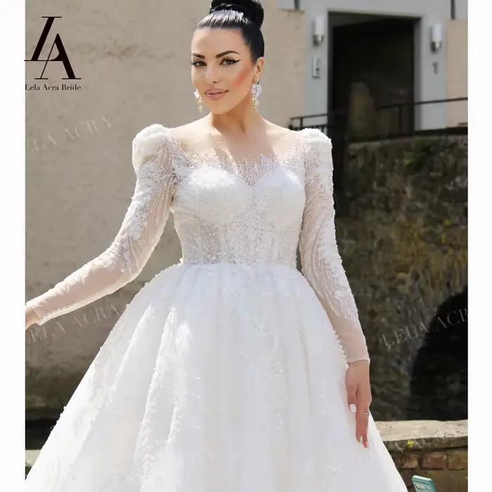 Robe de mariée trapèze à manches longues