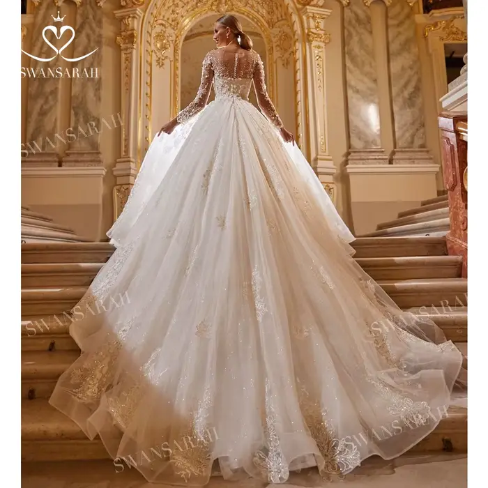 Robe de mariée de luxe perlée 2026 à manches longues avec appliques en dentelle