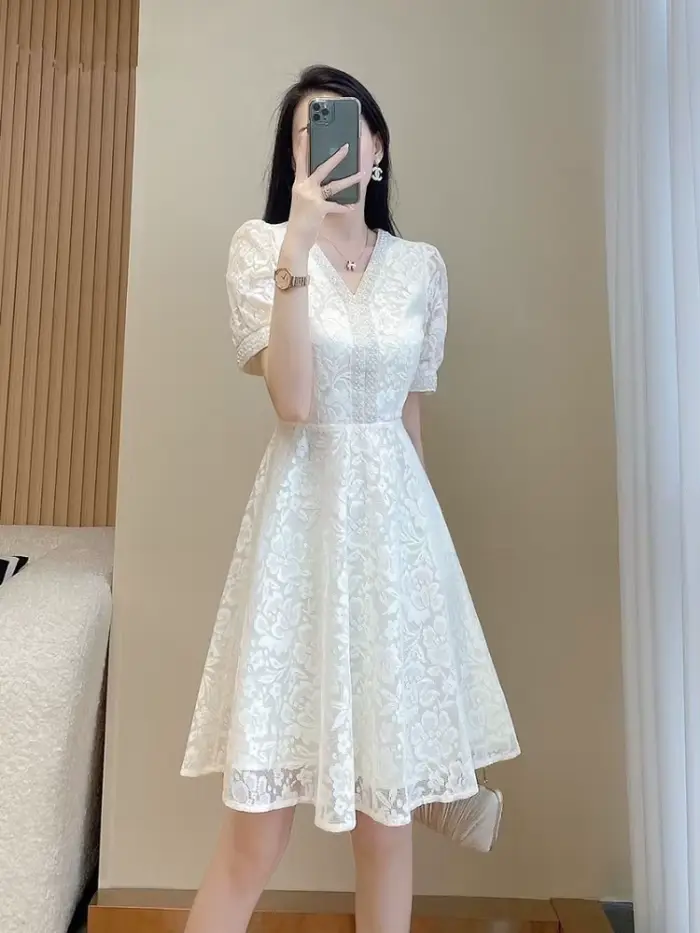 Robe mi-longue blanche pour femme