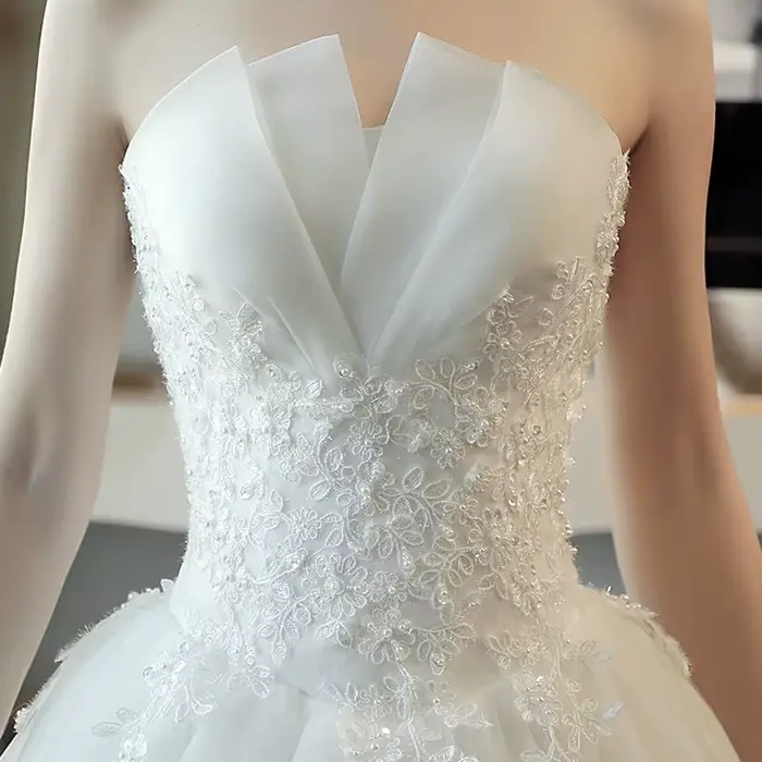 Robe de mariée traînante 2026