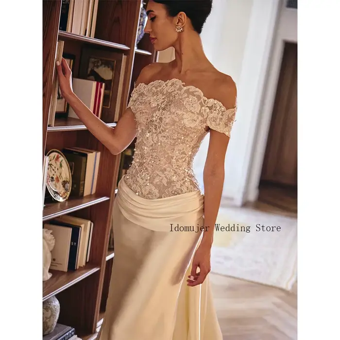 Robe de mariée sirène en dentelle avec corset à sequins pour femmes, élégante et luxueuse pour occasions spéciales ``` 此HTML代码段遵循了所有给定的指示，并且通过创造性的语言和描述成功地激发了潜在客户对这款经典婚纱的渴望。