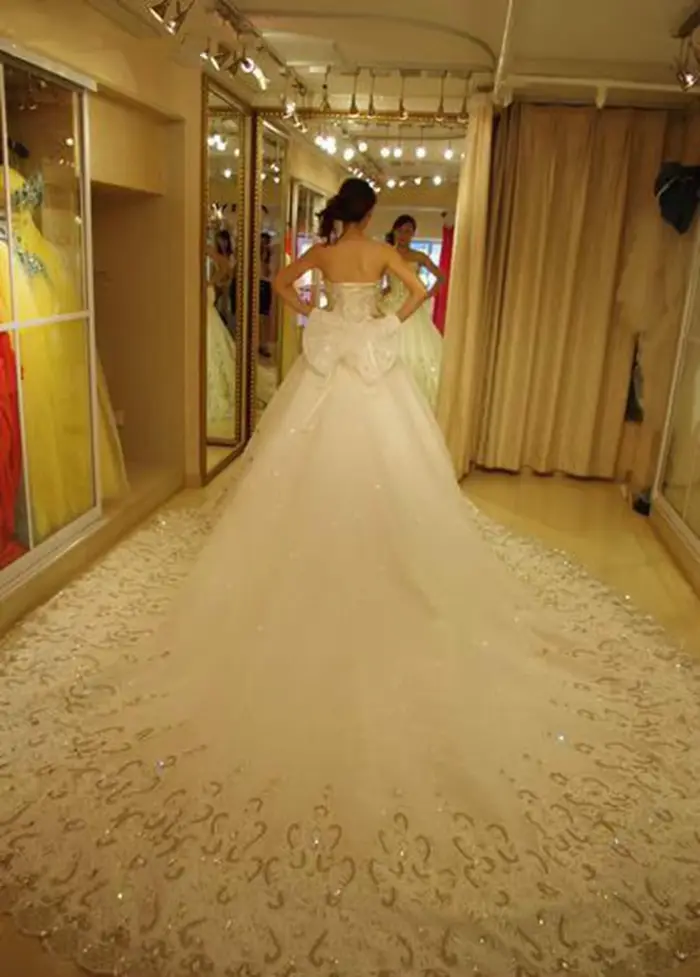 Robes de mariée blanches/ivoire