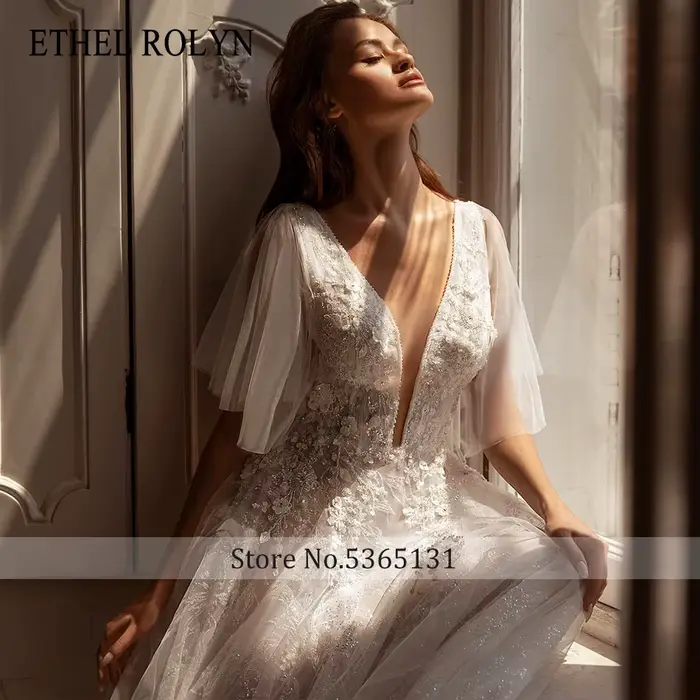 ETHEL ROLYN robe de mariée trapèze perles délicates fleurs col en v