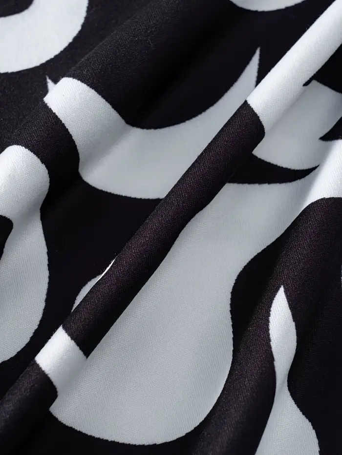 Robe de vacances imprimée noire et orange pour femmes