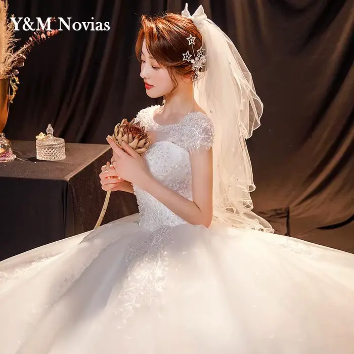 Robe de mariée en Tulle ivoire blanc cassé