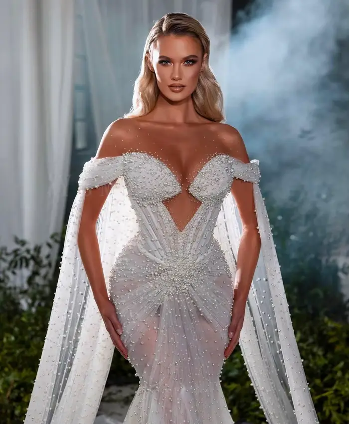 Robe de mariée sirène de luxe entièrement ornée de perles