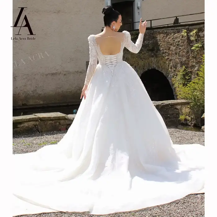 Robe de mariée trapèze à manches longues