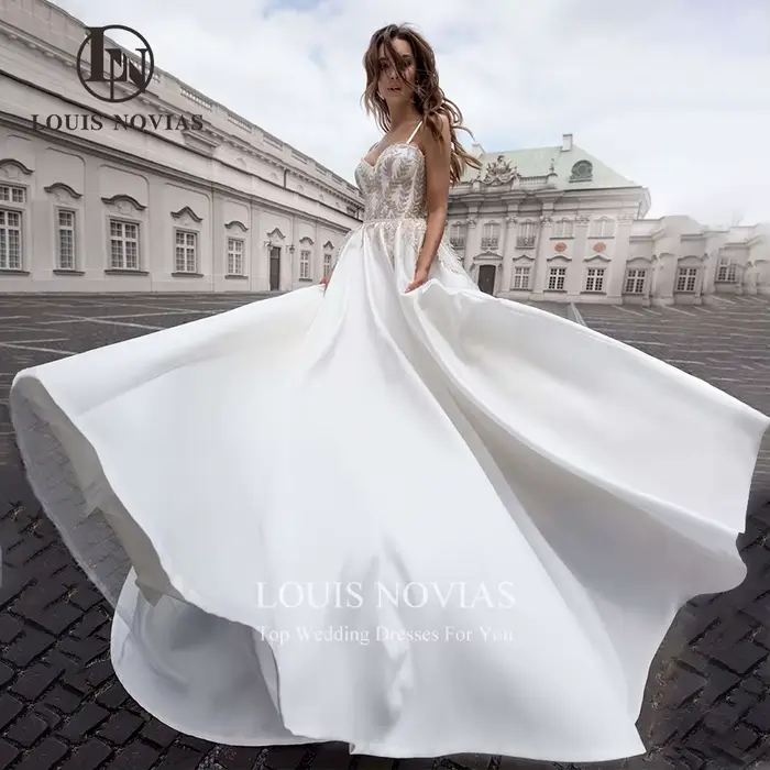 Modis-Robes de mariée élégantes avec bretelles spaghetti, appliques champagne, fronde réglable, lign
