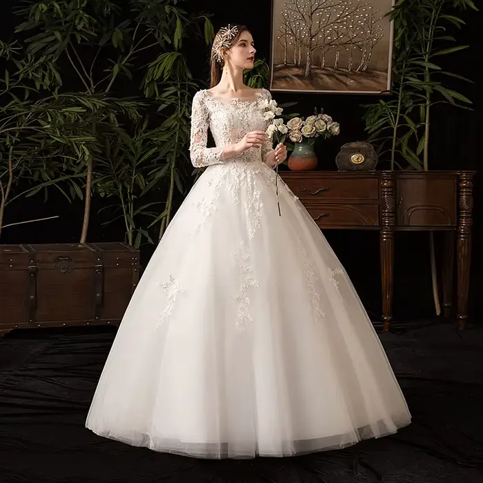 Robes de mariée en dentelle à manches longues