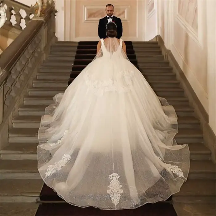 Robes de mariée de luxe en tulle brillant ivoire 2026