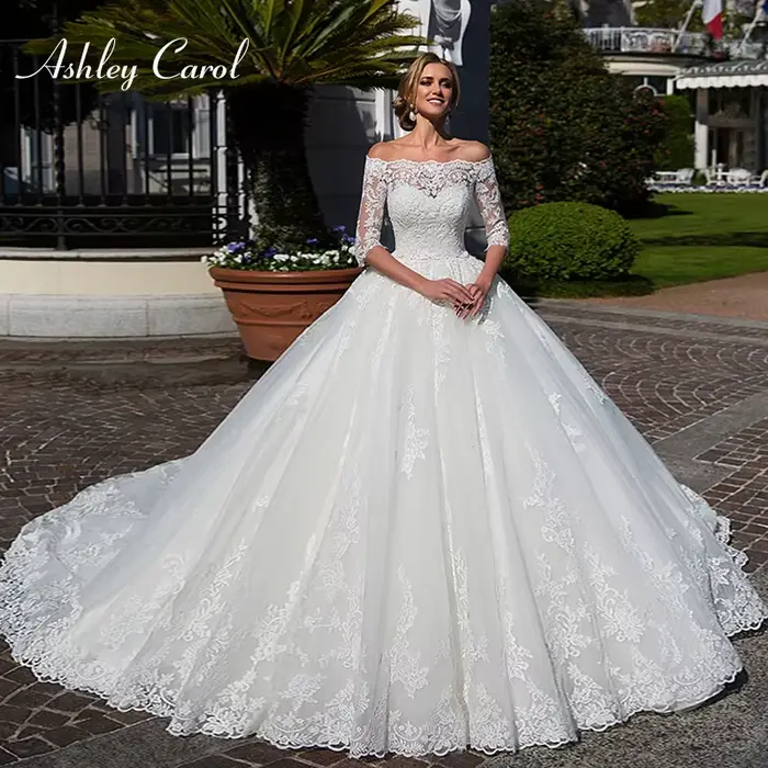 Robe de bal Ashley Carol col bateau avec veste luxe train de chapelle princesses mariées occasions spéciales