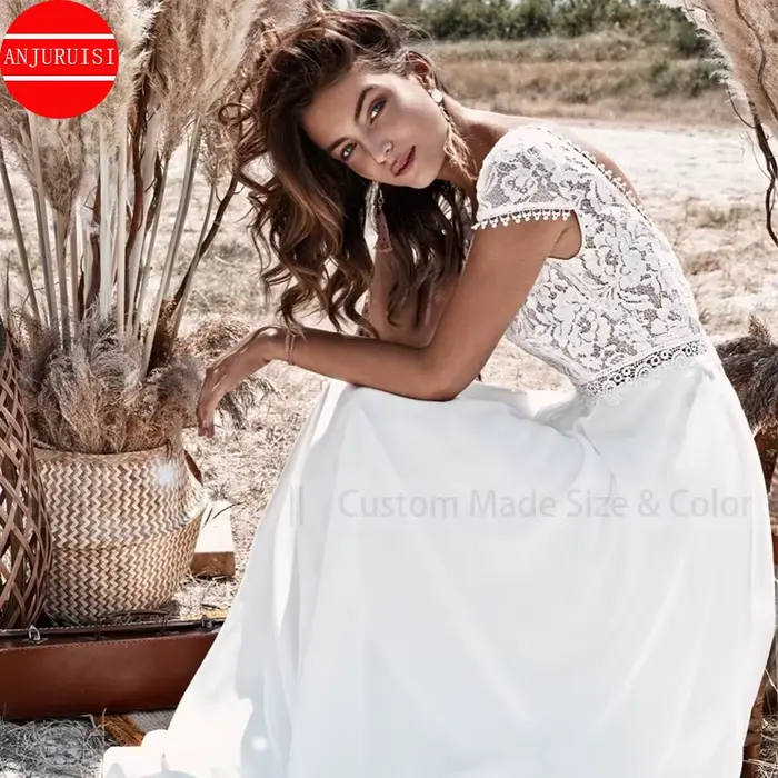 Robe de mariée bohème à manches courtes avec appliques en dentelle