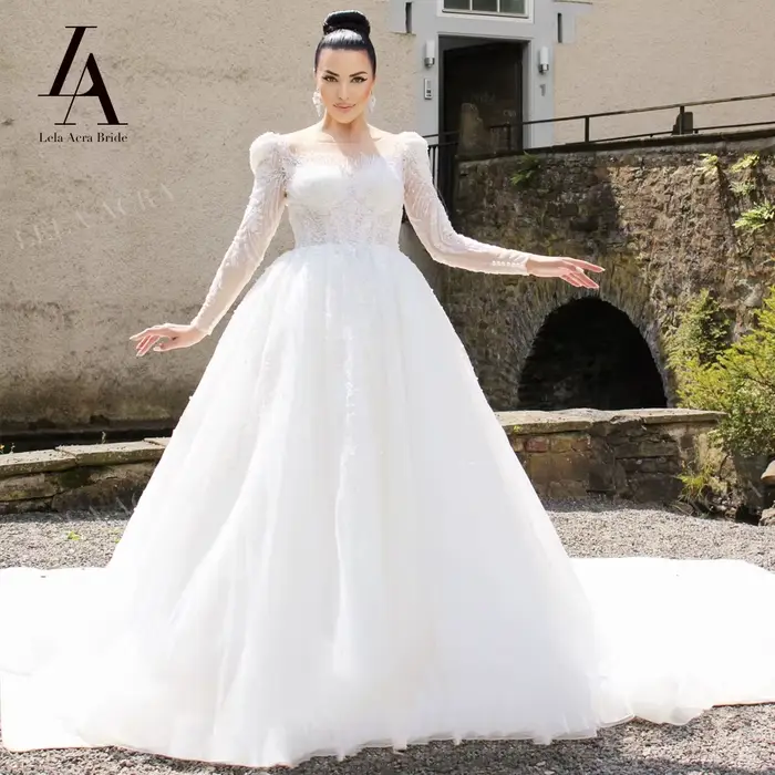 Robe de mariée trapèze à manches longues