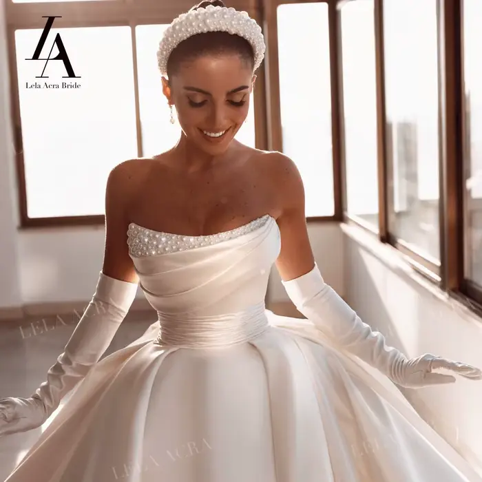 Magnifique robe de mariée en perles 2026 Satin sans manches