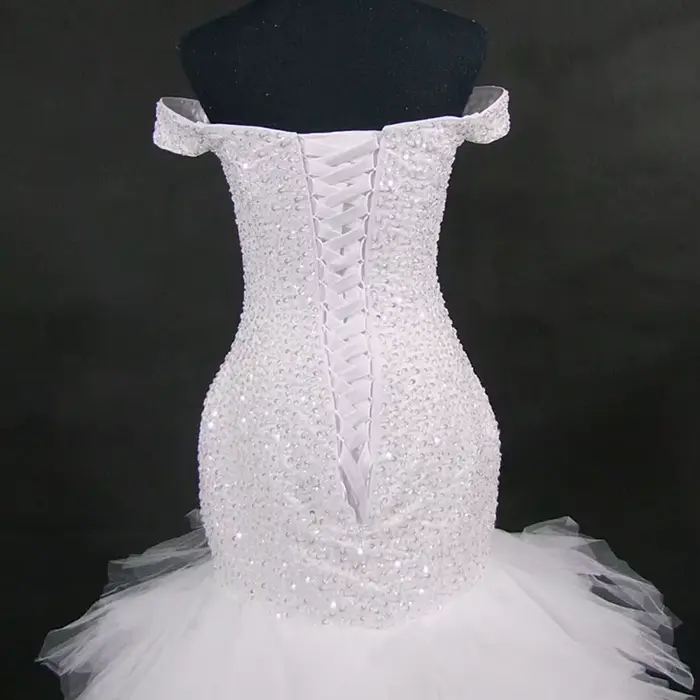 Robes de mariée et de soirée asymétriques à une épaule
