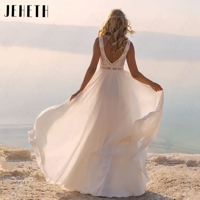 JEHETH Robe de Mariée Bohème Sans Manches Mousseline Coupe A Sur Mesure Col V Profond Dos Nu Appliques Dentelle Taille Découpée Jupe Longue Flottante Mariage Plage Shooting Coucher de Soleil Bord de M