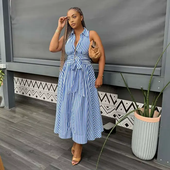 Robe longue femme coupe trapèze Y2K streetwear sans manches col rabattu élégante pour soirées et travail polyester composition fibre synthétique多种语言的代码,指示创建一个HTML页面来描述一件女士长裙的产品信息,并且要求使用中文撰写。请将回应转换为中文,并确保HTML结构符合要求。