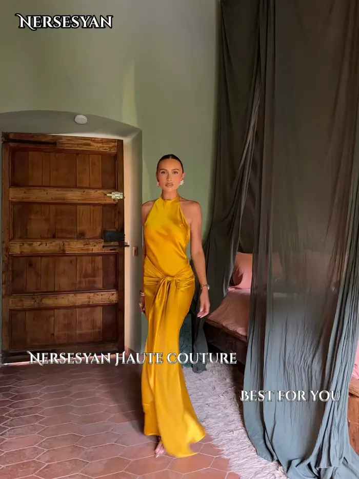 Robe de soirée sirène personnalisable Nersesyan avec décolleté hors épaule pour femmes occasions spéciales comme mariage soirées galas et cérémonies