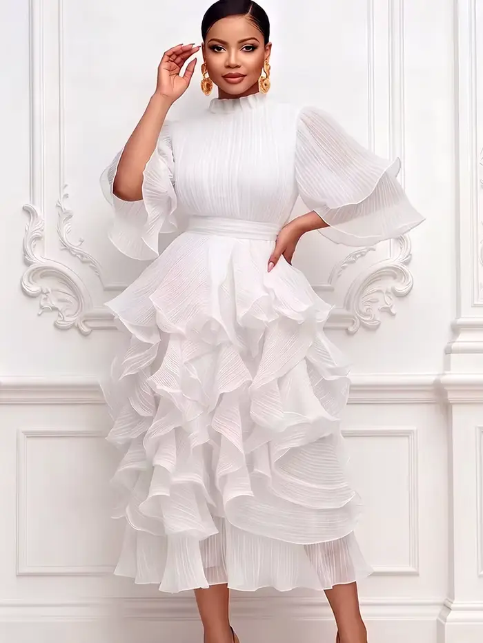 Robe midi plissée en mousseline à volants