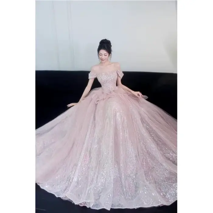 Robe de mariée rose à paillettes, jupe longue queue de poisson