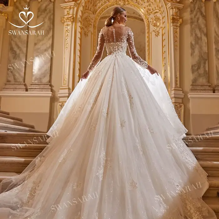 Robe de mariée de luxe perlée 2026 à manches longues avec appliques en dentelle