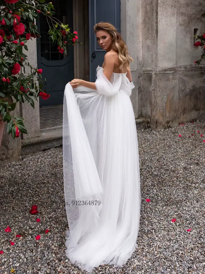 Robes de mariée bohèmes élégantes avec appliques en dentelle et perles