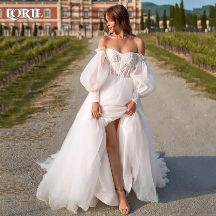 Robe de mariée à manches bouffantes