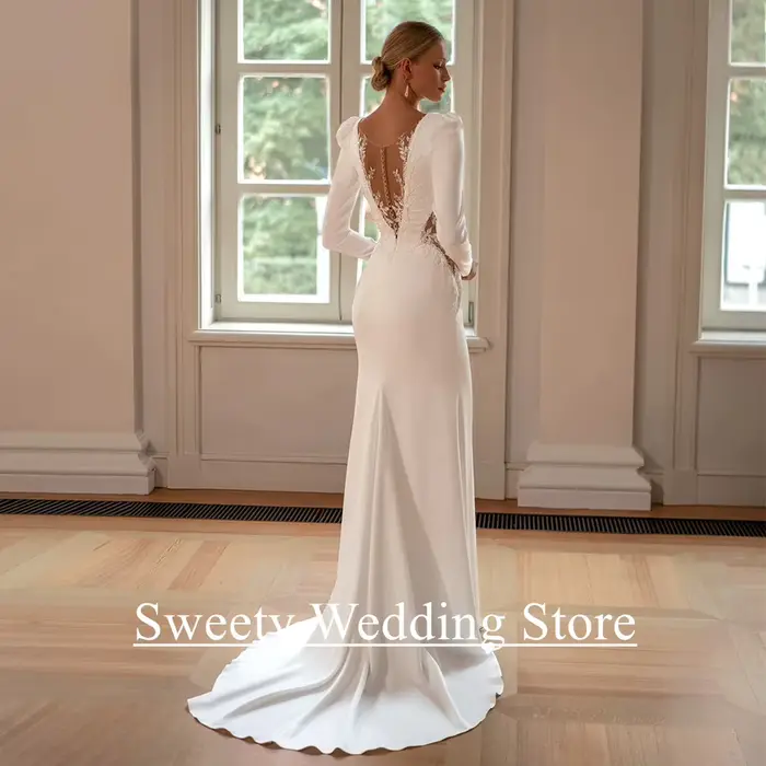 Robe de mariée sirène sexy personnalisée avec col en V profond, manches longues, appliques de perles et train de balayage pour cérémonie de mariage et occasions spéciales