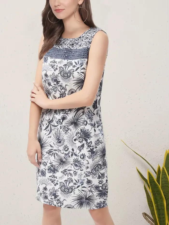 Robe d'été sans manches style resort avec poches 2026
