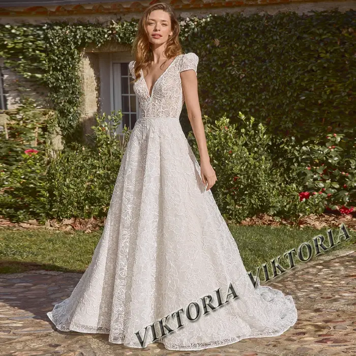 Robe de Mariage Exquise à Manches Bouffantes et Col en V pour Femme