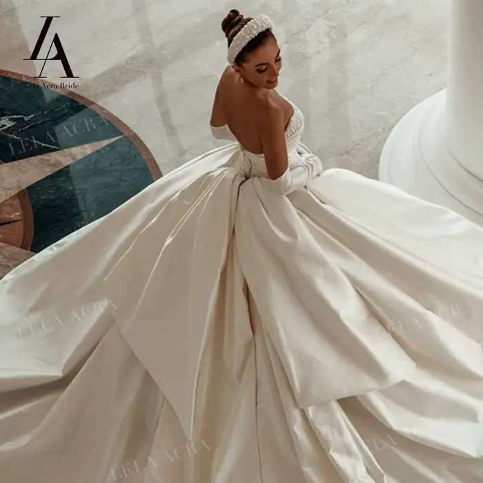 Magnifique robe de mariée en perles 2026 Satin sans manches