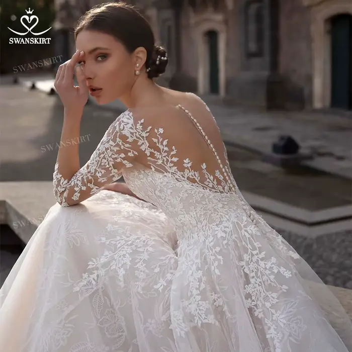 Robe de mariée à manches longues en dentelle