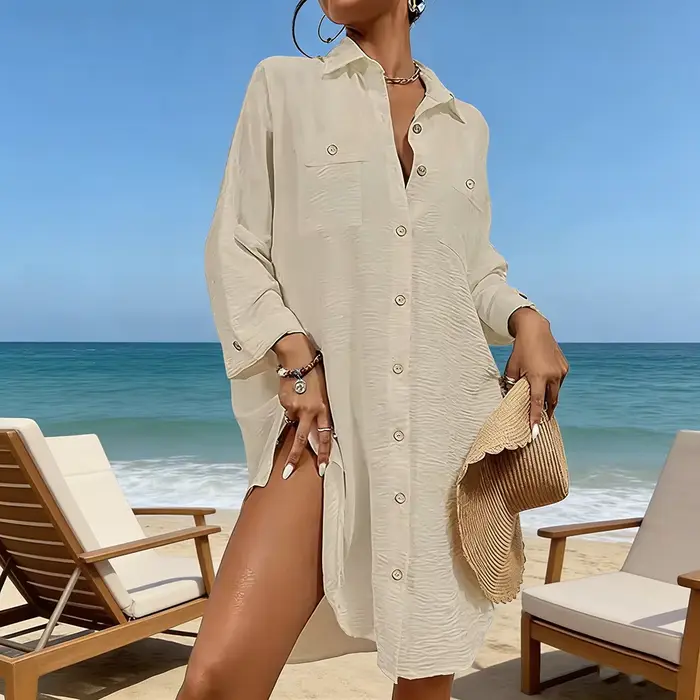 Robe chemise ample pour femme à manches longues et boutonnée.
