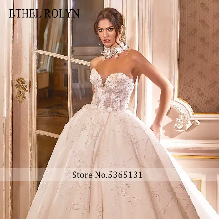 ETHEL ROLYN robe de mariée trapèze délicate broderie de perles chérie sans manches