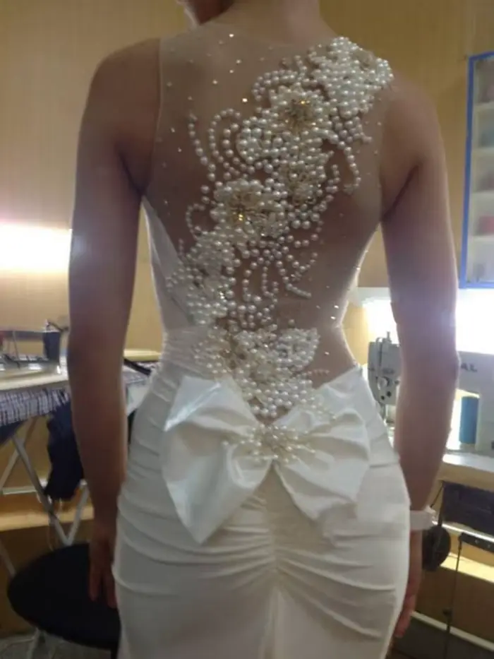 Robe de mariée élégante sirène en polyester perlée sans manches pour femmes occasions spéciales