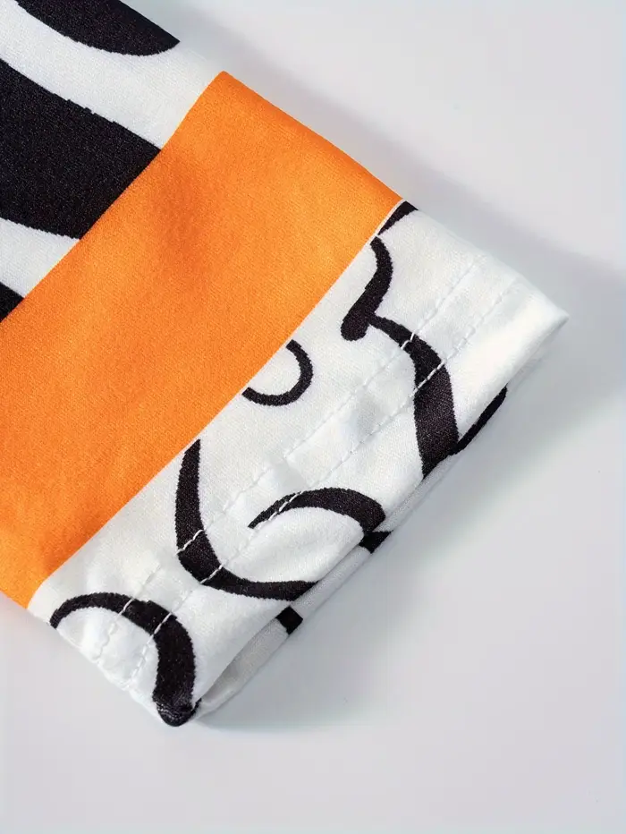 Robe de vacances imprimée noire et orange pour femmes