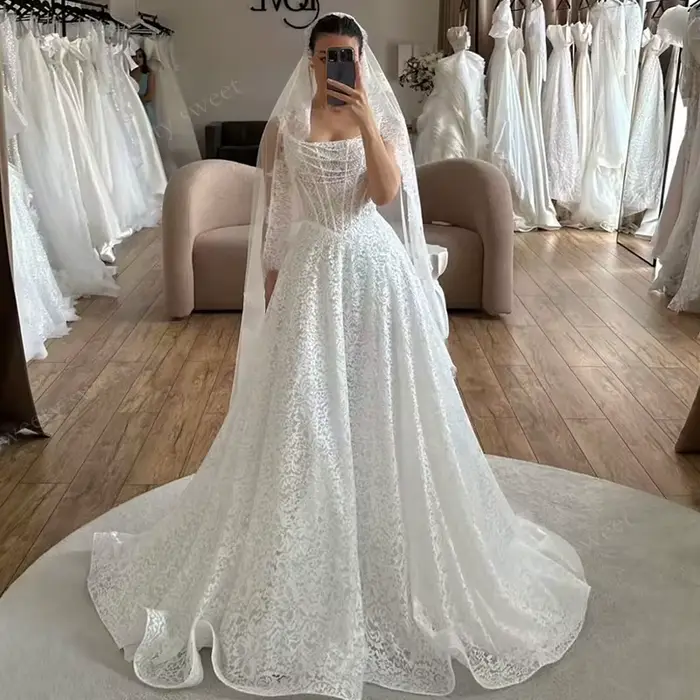Robe de mariée élégante en dentelle brodée sur filet