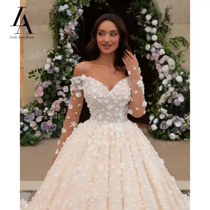 Robe de mariée à manches longues 2026 romantique perlée 3D fleurs