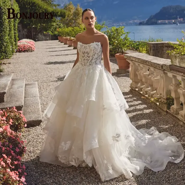 BONJOURY charmante robes de mariée pour les femmes sans manches bouton froncé Appliques chérie Tulle