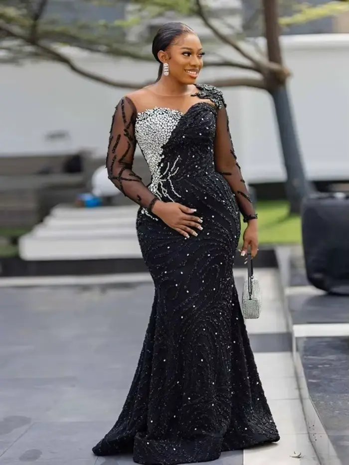 Robe de soirée sirène noire à paillettes avec train de balayage et décolleté hors de l'épaule élégante pour événement gala et mariage