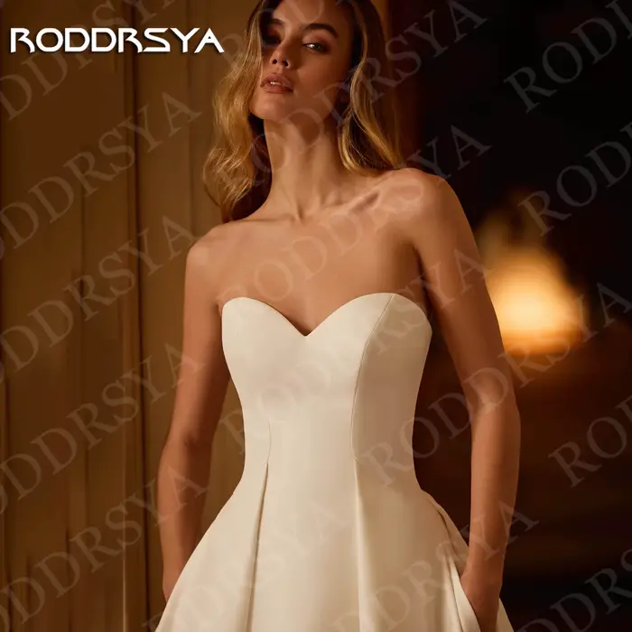 Robe de mariée RODDRSYA en satin sans bretelles pour femme, silhouette en une ligne, décolleté Mon Amour, fermeture éclair invisible, soutien-gorge intégré, pour occasions spéciales
