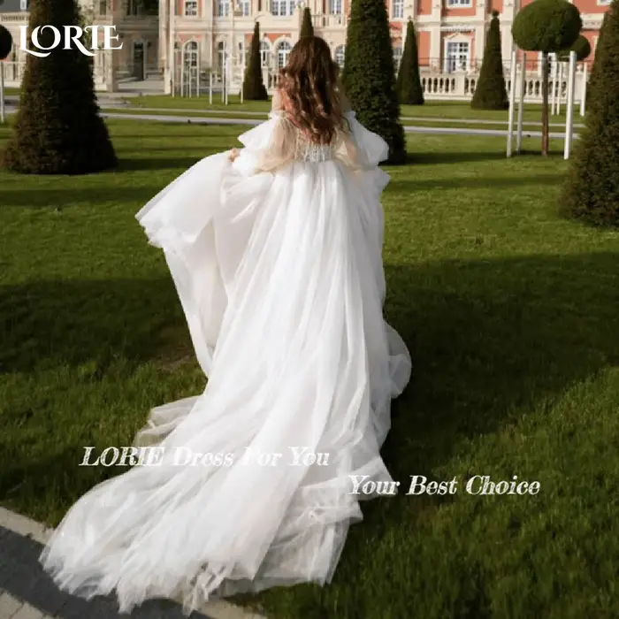 Robe de mariée à manches bouffantes